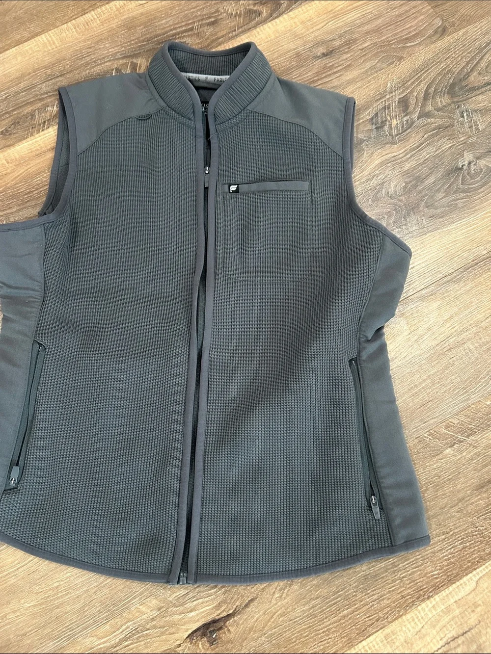 Fabletics men’s gray vest feel good performance, large zip pockets